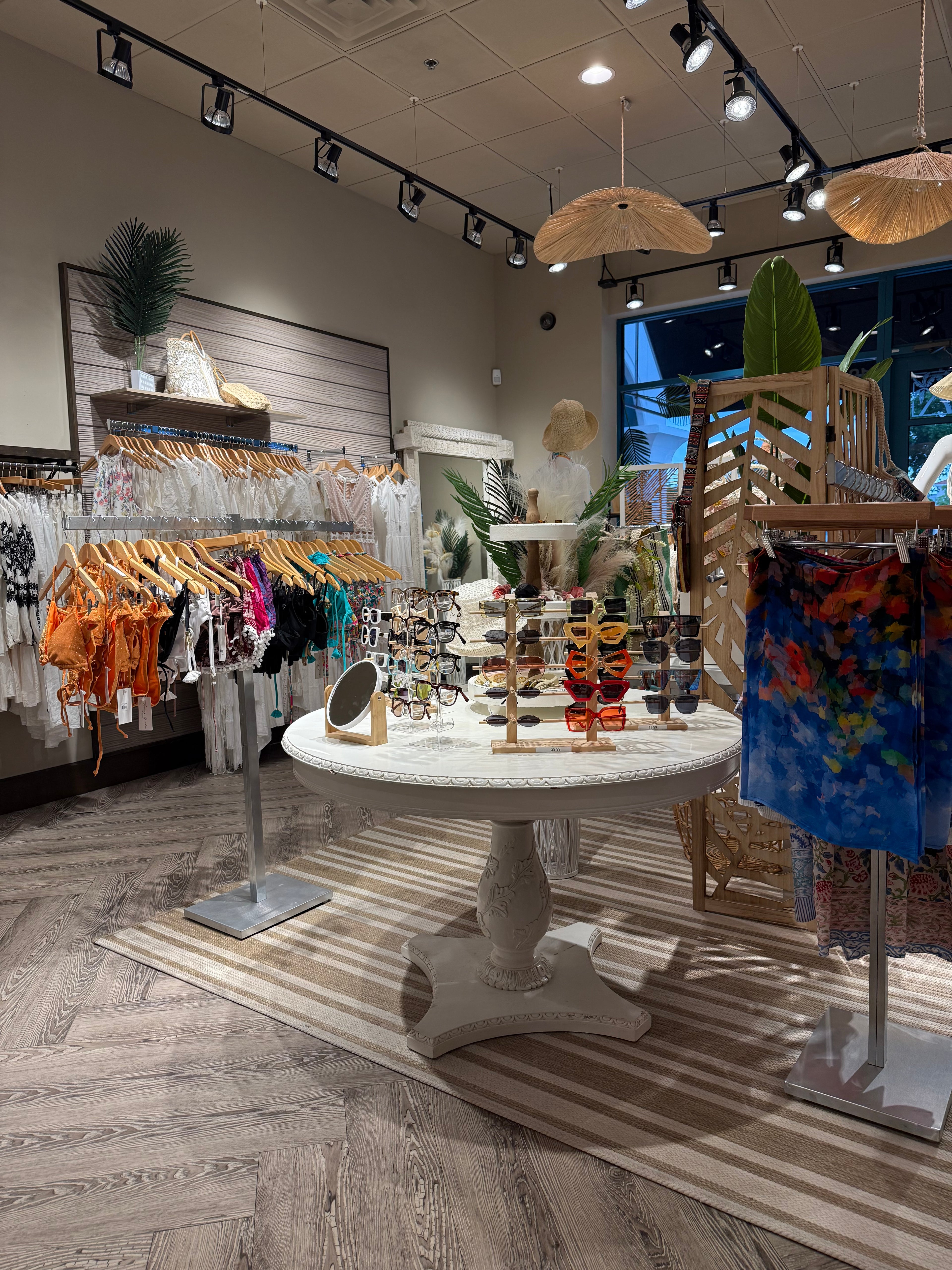 Interior of Vetu store with various products on shelves and display tables.